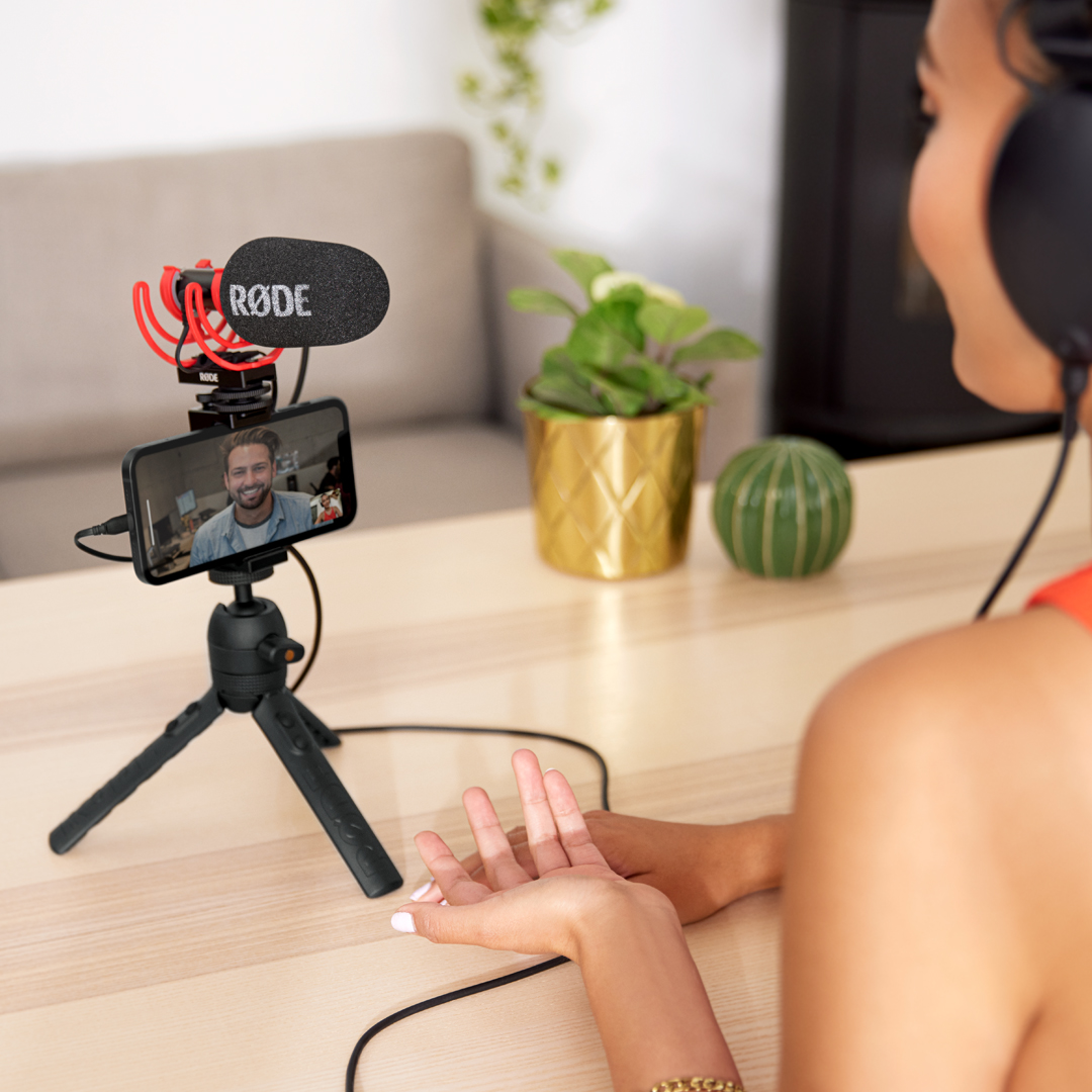 Girl on phone with caller and VideoMic Go II front
