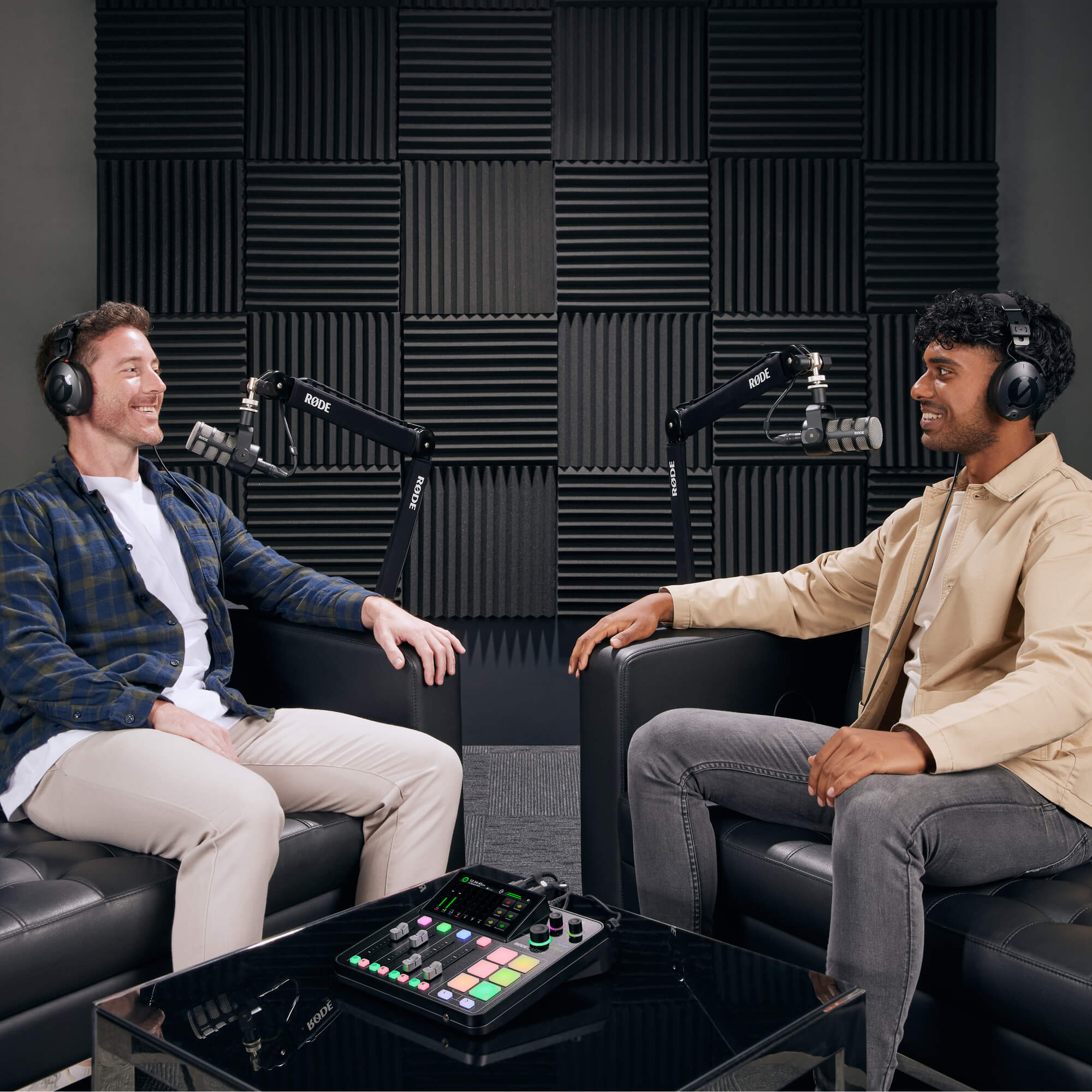 IMAGE: Two people in a podcast setting