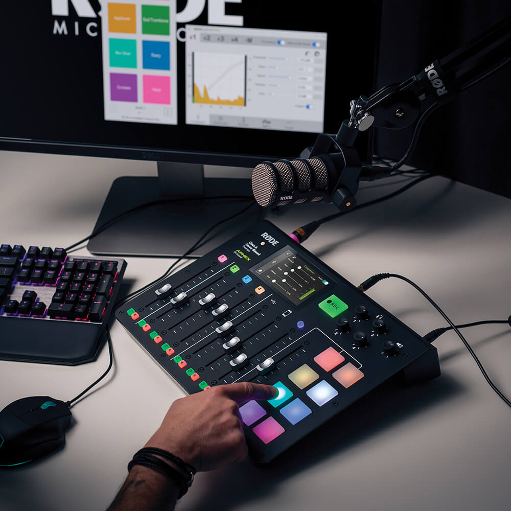 Finger pressing RØDECaster Pro sound pad