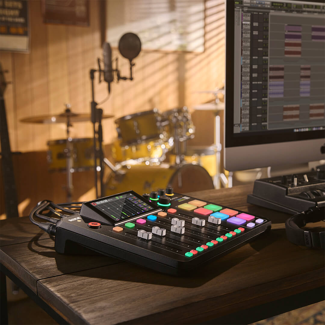 RØDECaster Pro II next to computer screen showing Ableton with NT1-A in background