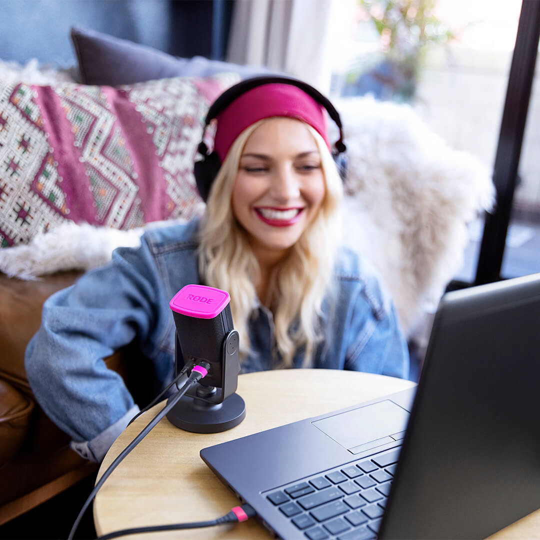 Girl with laptop and NT-USB mini microphone connected