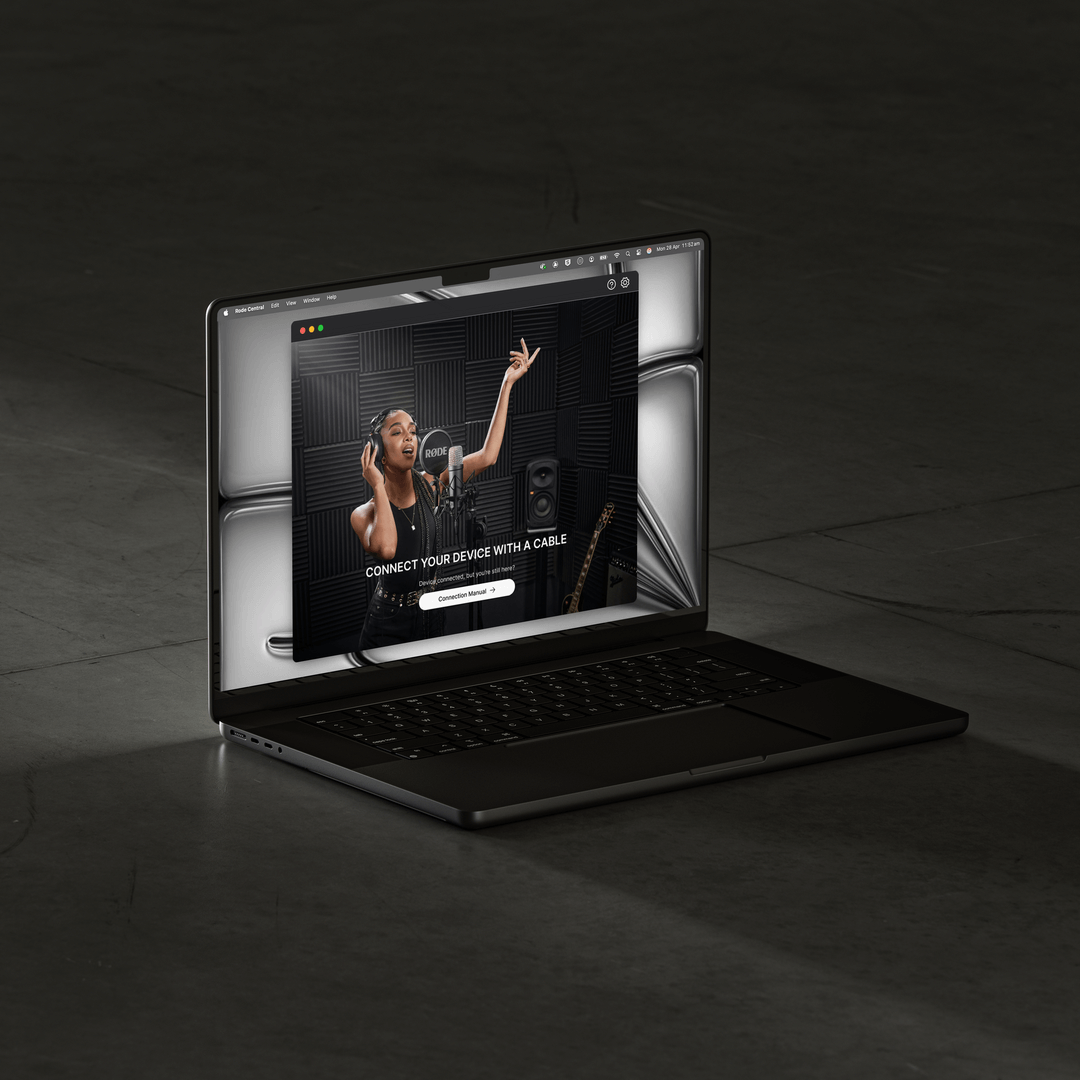 Hand holding iPhone showing RØDE Central