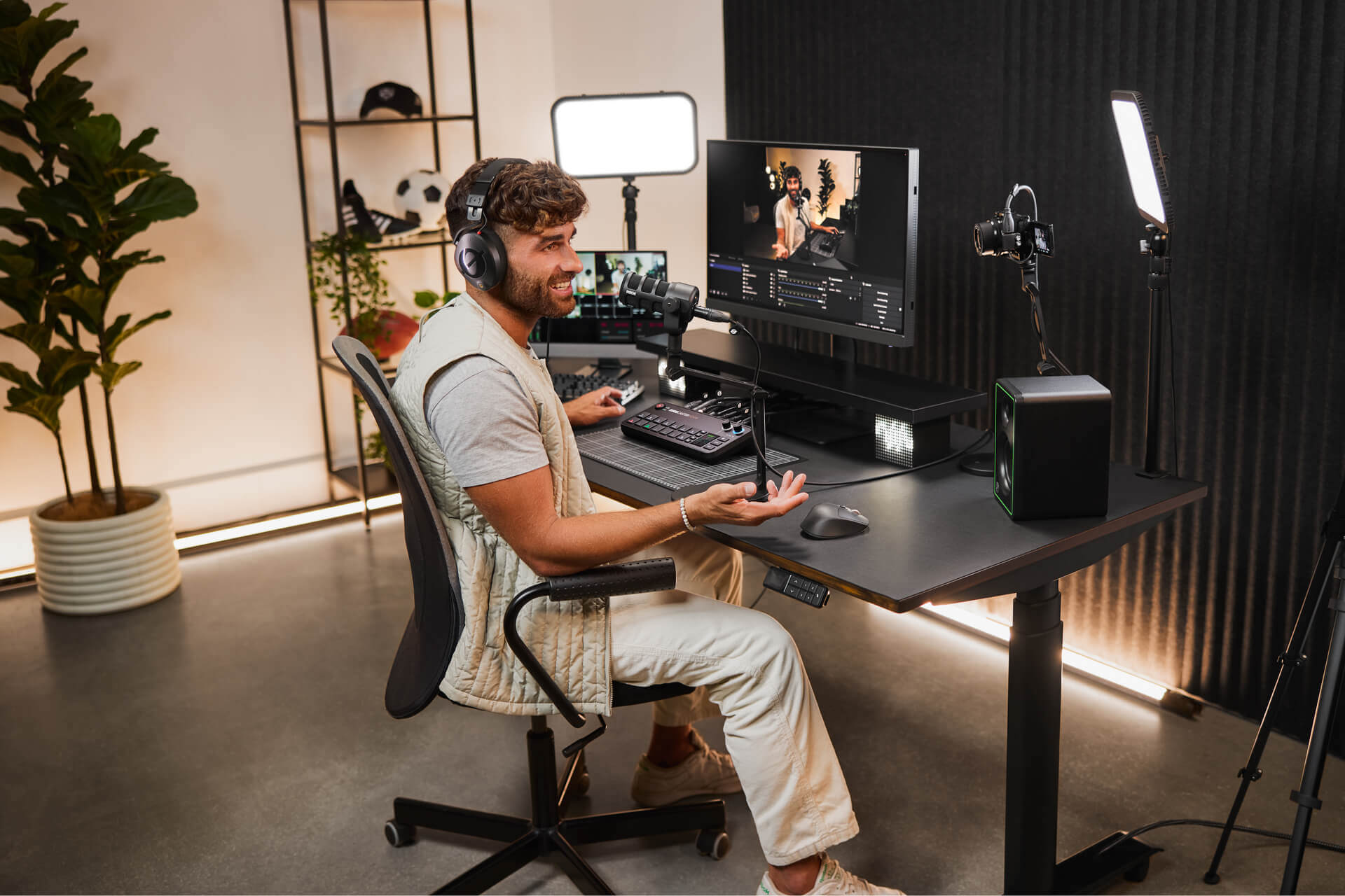 Person using RØDECaster Video desk setup for streaming