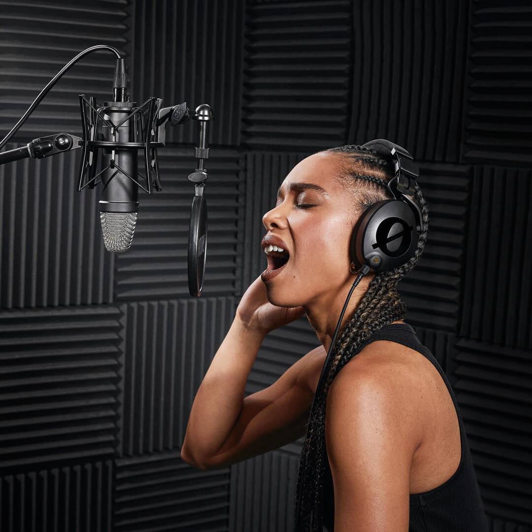 Vocalist in recording studio using NTH-100