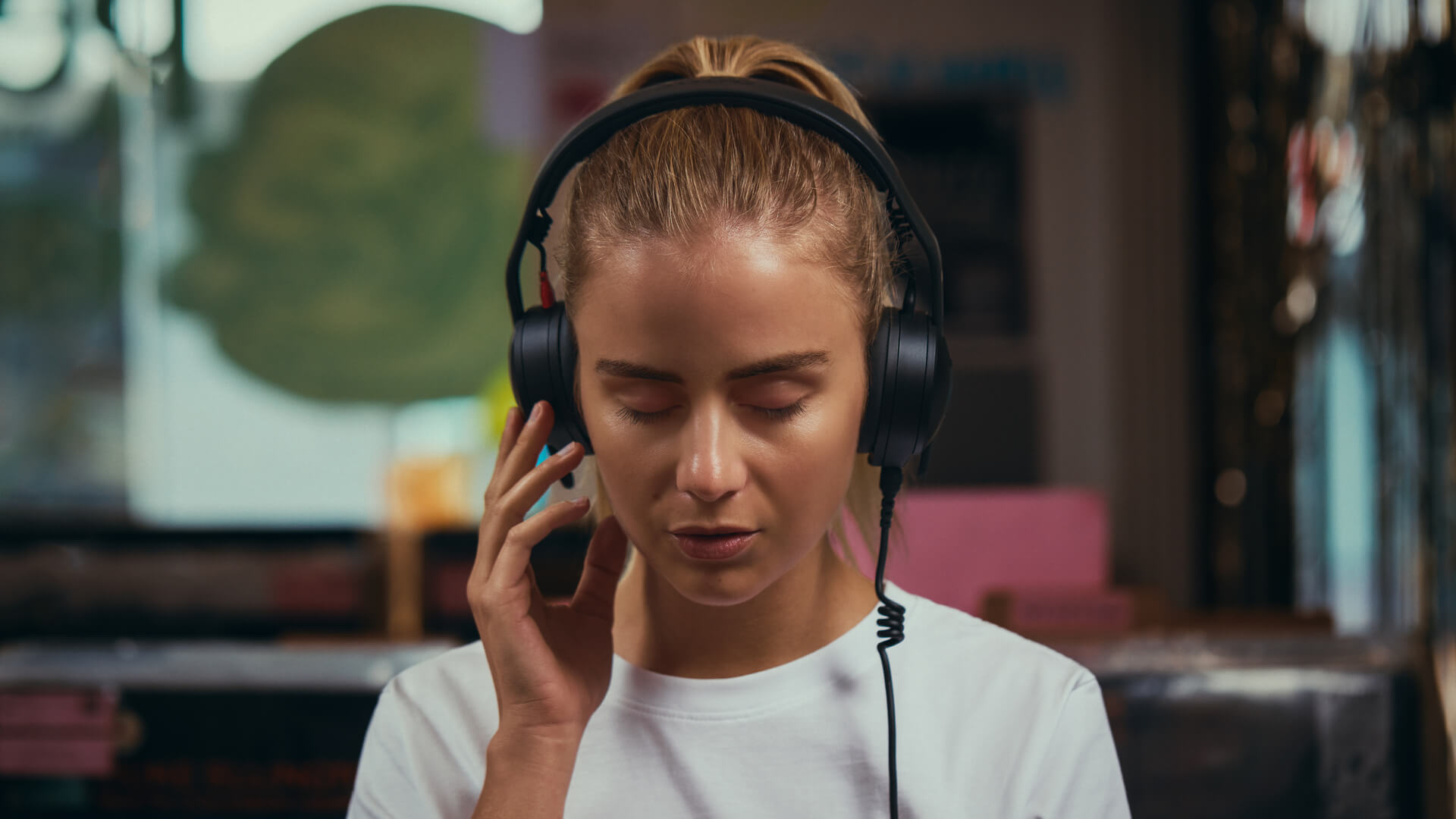 Record store shopper listening with NTH-50