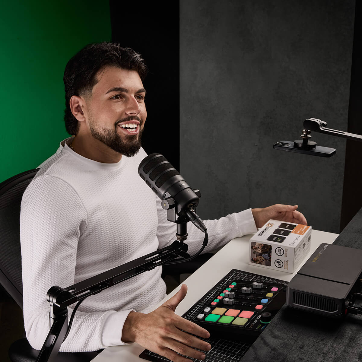 Solo streamer at a desk recording a video.