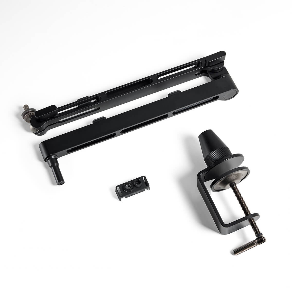 LPA1, thread adaptors, and desk clamp lying on white background