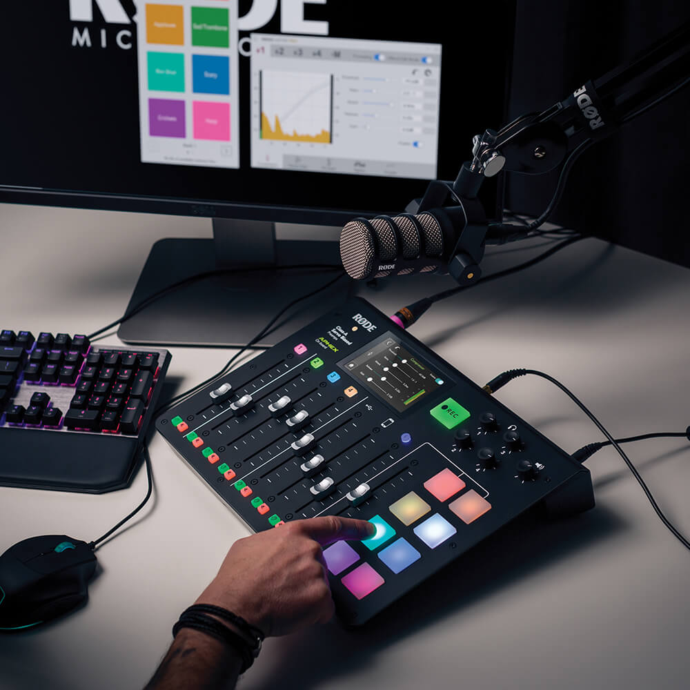 RØDECaster Pro on desk with finger pressing sound pad